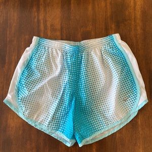 nike blue and white patterned athletic shorts